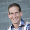 Headshot of Ramy Nassar, author of the AI Product Design Handbook.