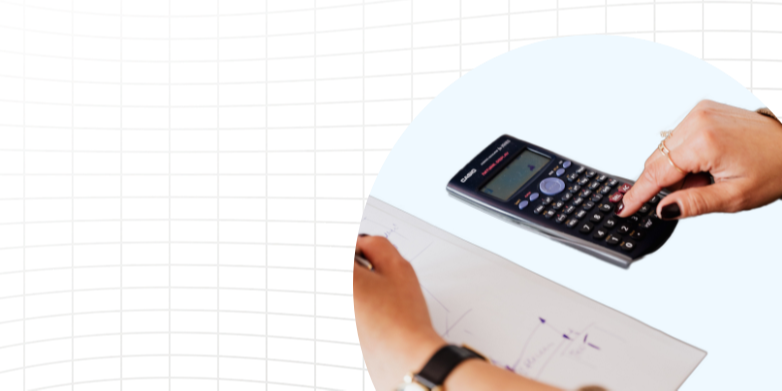 Hands using calculator and drawing graphs on a grid background.
