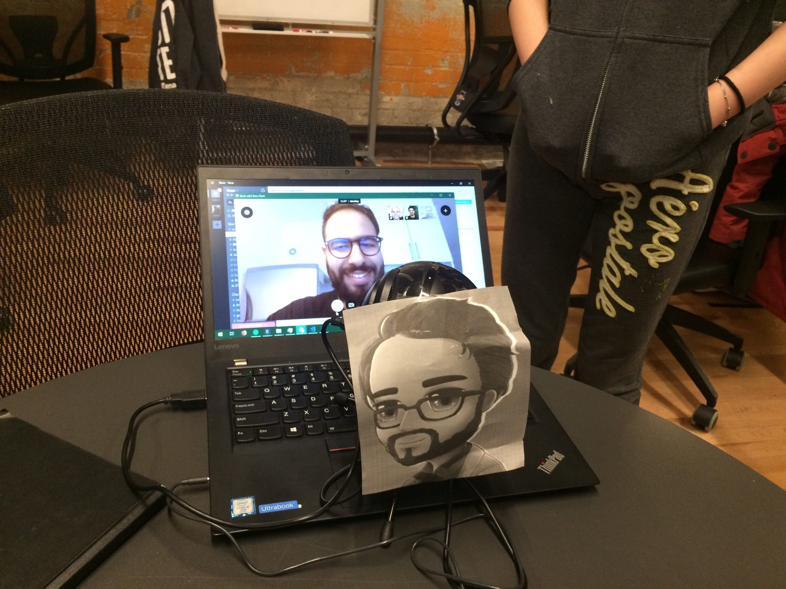 Mustafa doing a stand-up meeting remotely