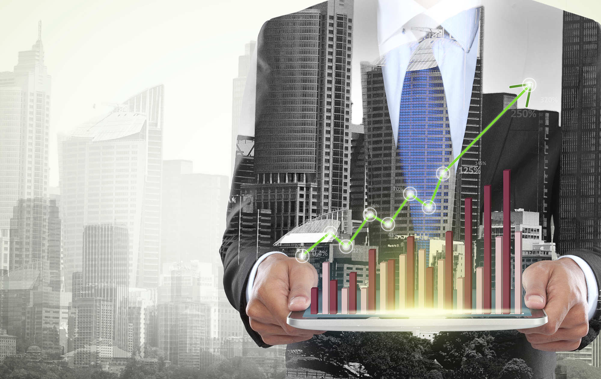 Businessman Holding Holographic Graphs