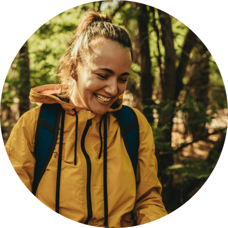 Image of a woman hiking in the woods