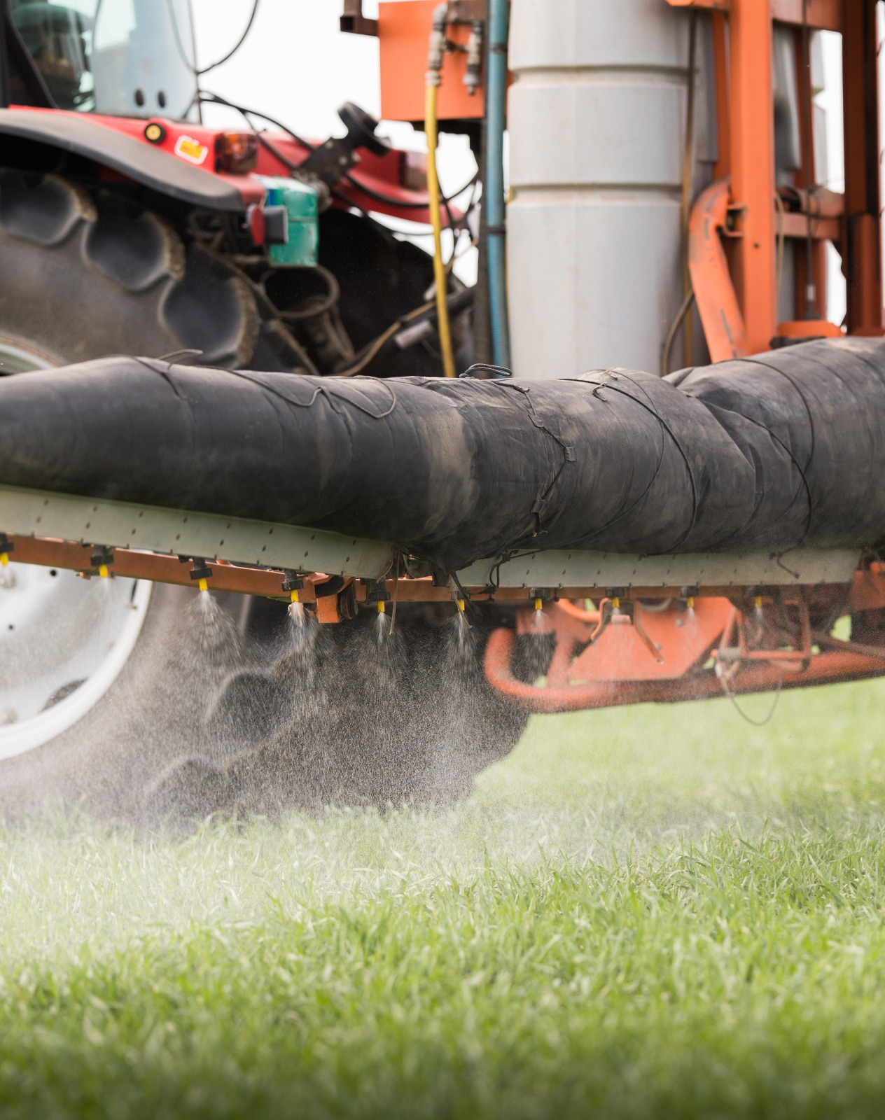 A machine spraying grass