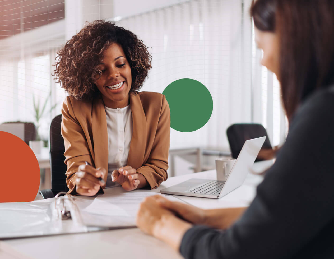 A Black woman working at the office